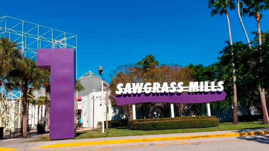 Sawgrass Mills entrance in Sunrise, Florida, a shopping destination that can be expensive to visit without a car