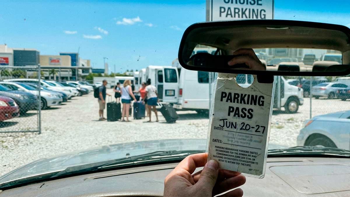 Budget-friendly off-site cruise parking in Miami showing a shuttle station and parking pass validation.