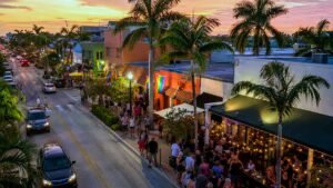 Wilton Drive in Wilton Manors, the most concentrated LGBTQ+ neighborhood in South Florida, showing the walkable strip that makes it different from Miami Beach's scattered gay scene.