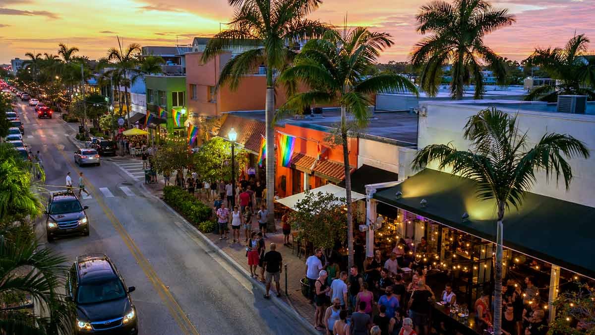 Wilton Drive in Wilton Manors, the most concentrated LGBTQ+ neighborhood in South Florida, showing the walkable strip that makes it different from Miami Beach's scattered gay scene.